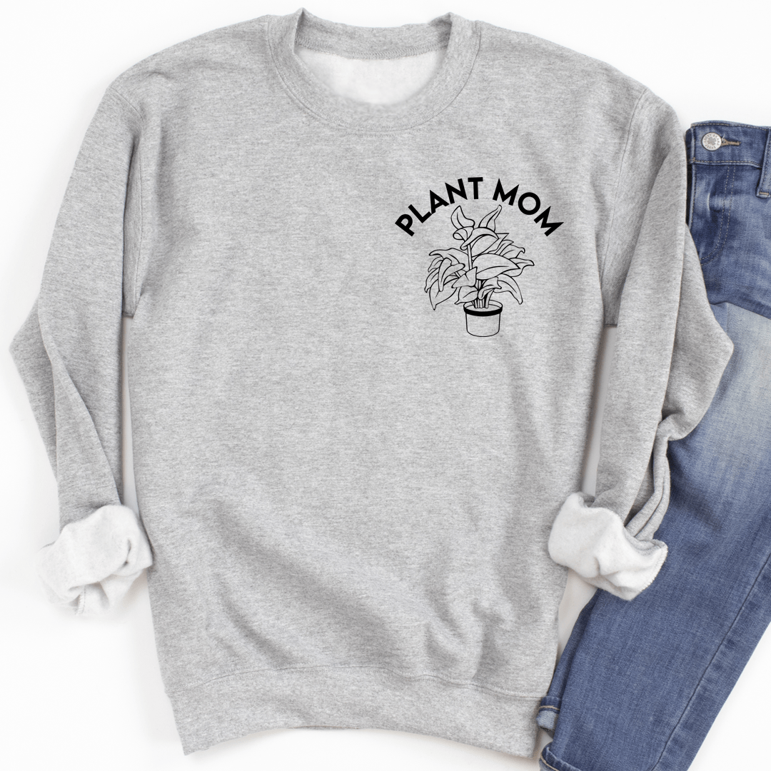 Cozy Plant Mom sweats featuring a cotton/poly fleece blend, designed by top artists, perfect for plant lovers.