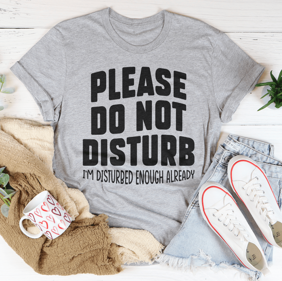 A comfortable Please Do Not Disturb T-Shirt made from soft ring-spun cotton, featuring double stitching for durability.