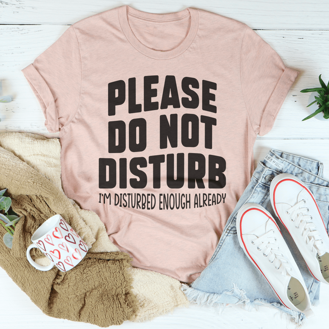 A comfortable Please Do Not Disturb T-Shirt made from soft ring-spun cotton, featuring double stitching for durability.