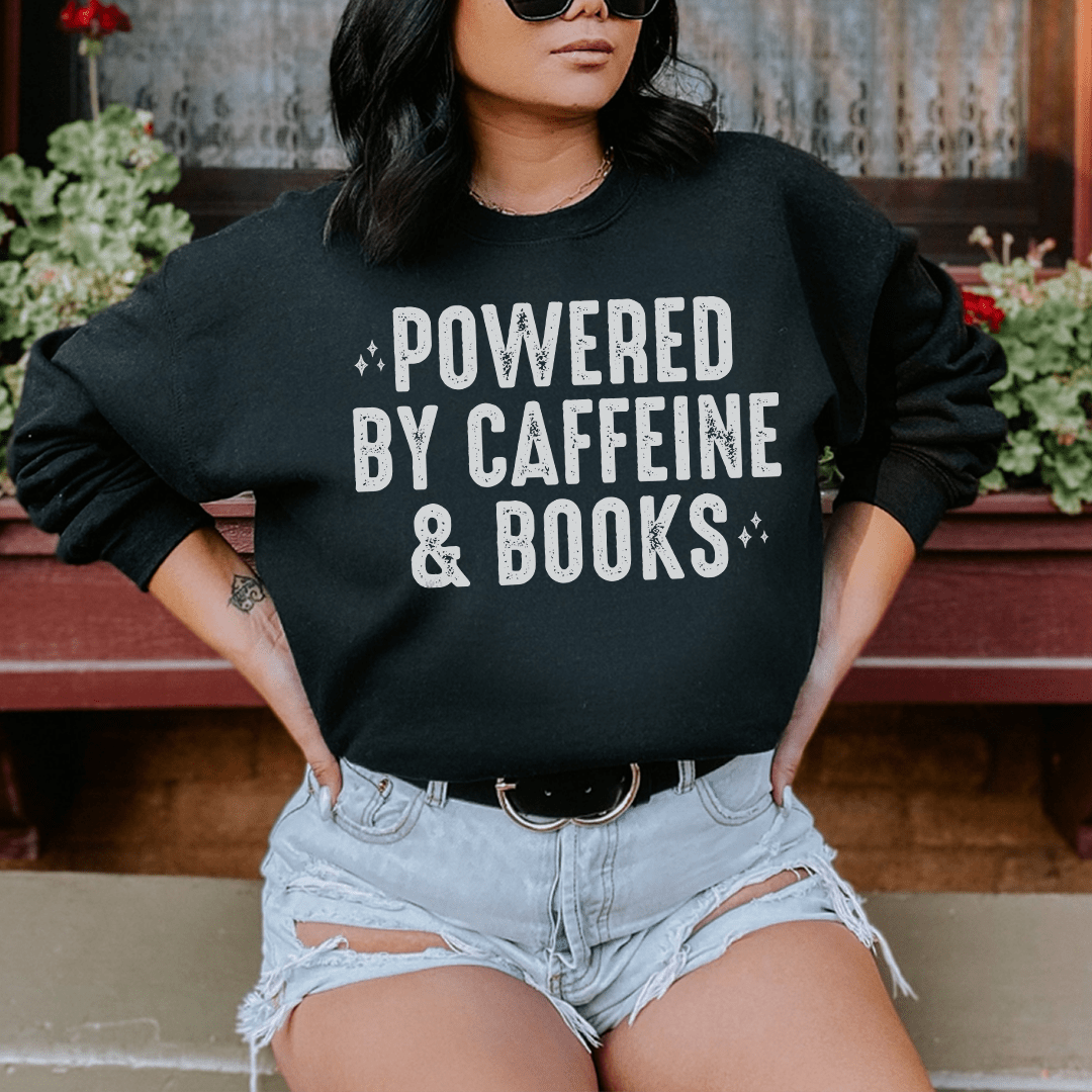 Cozy sweats featuring a unique design inspired by caffeine and books, perfect for book lovers.