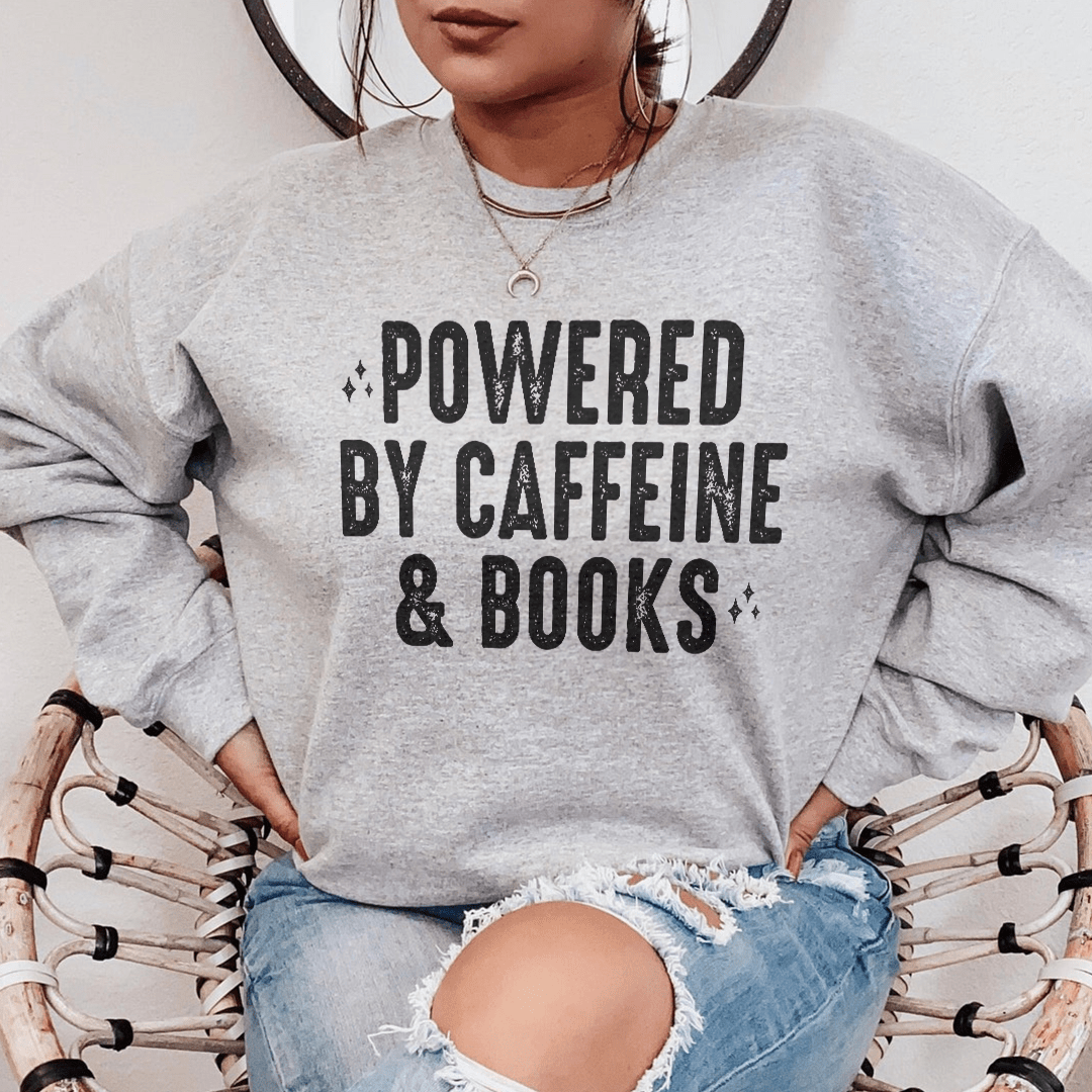 Cozy sweats featuring a unique design inspired by caffeine and books, perfect for book lovers.