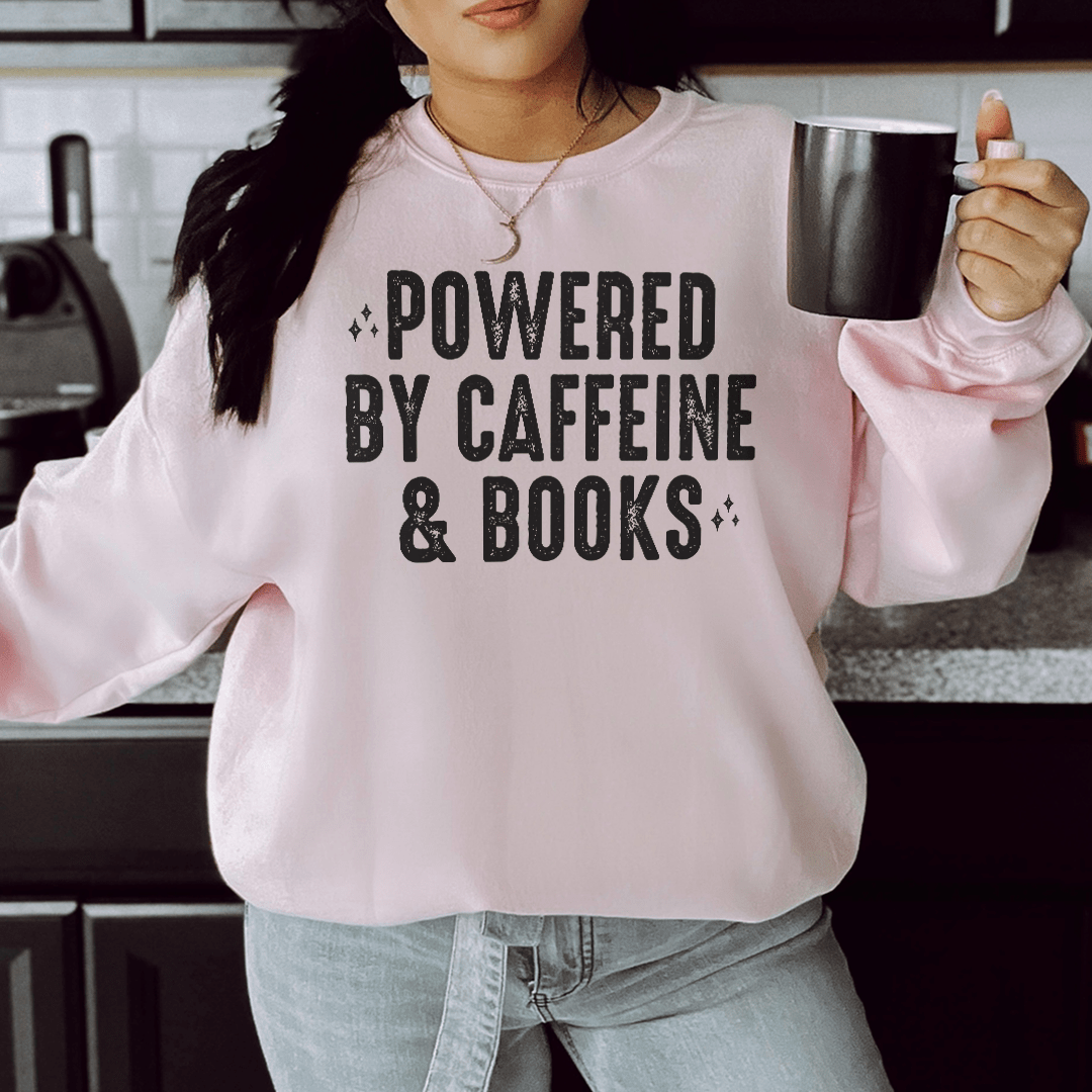 Cozy sweats featuring a unique design inspired by caffeine and books, perfect for book lovers.