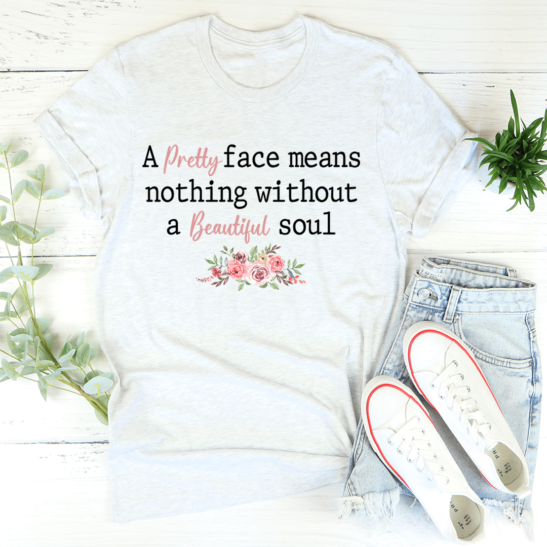 A stylish Pretty Face T-Shirt made of soft ring-spun cotton, featuring double stitching for durability and available in various sizes.