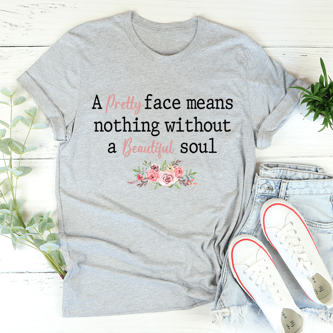 A stylish Pretty Face T-Shirt made of soft ring-spun cotton, featuring double stitching for durability and available in various sizes.