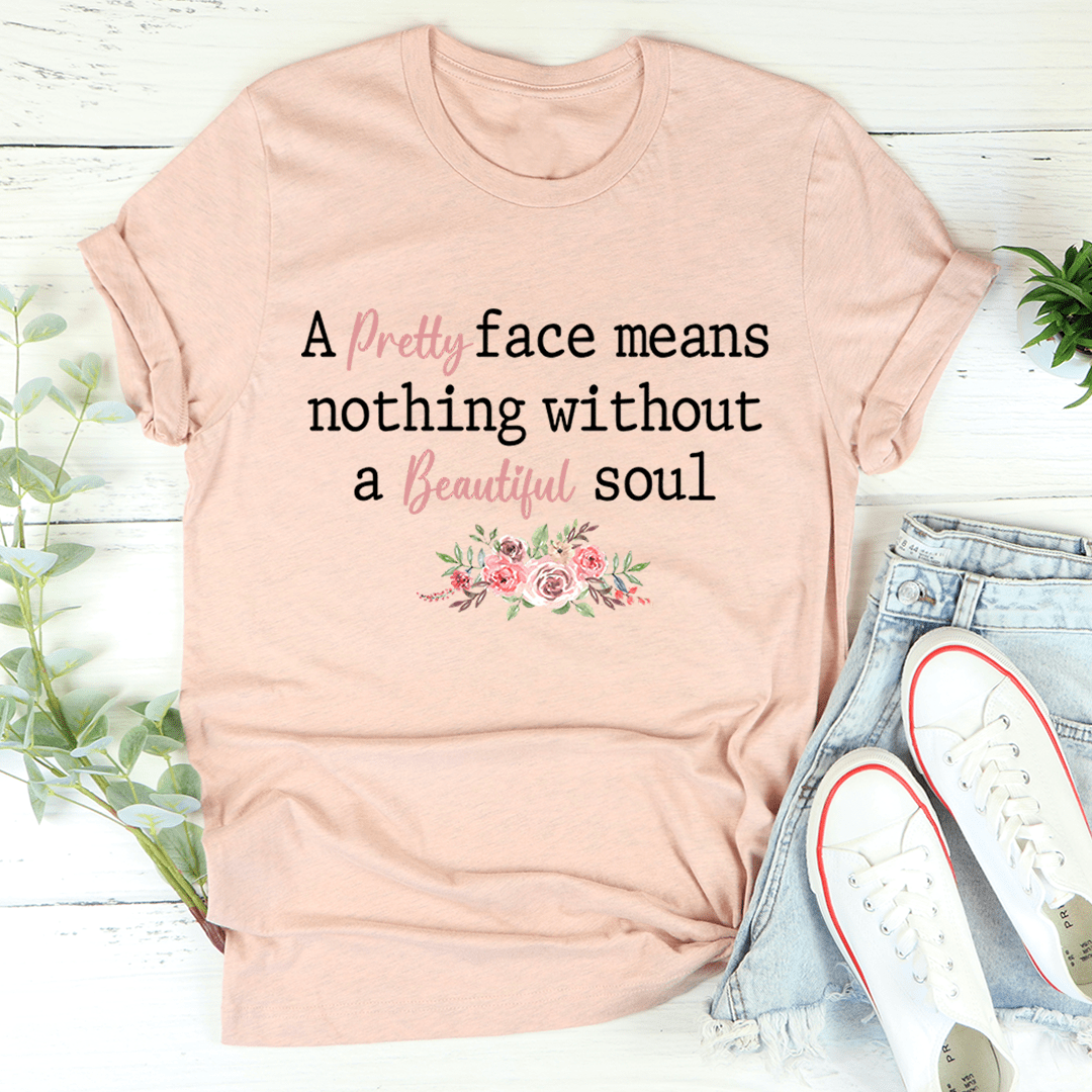 A stylish Pretty Face T-Shirt made of soft ring-spun cotton, featuring double stitching for durability and available in various sizes.