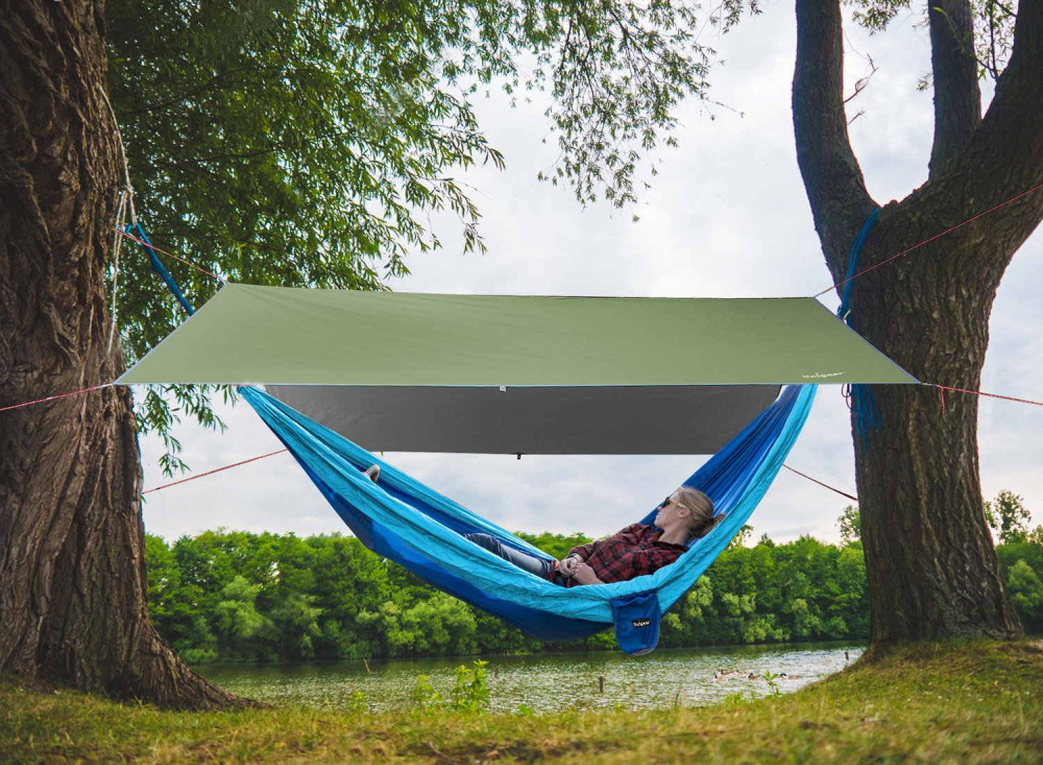 Rainproof Camping Tarp Shelter made of durable Oxford fabric, showcasing its waterproof features and spacious design for outdoor protection.