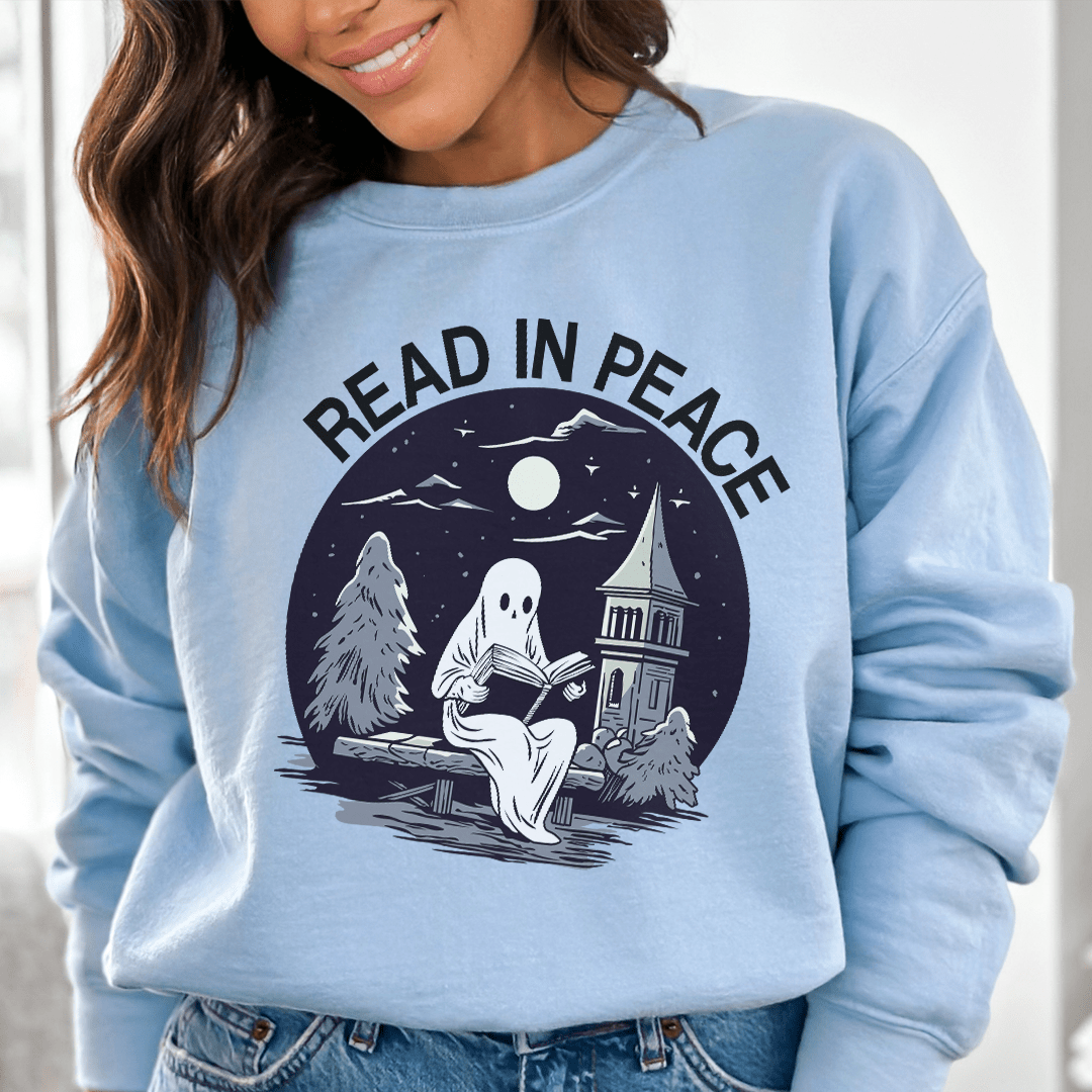 Cozy 'Read In Peace' sweats featuring unique designs by top artists, made from a warm cotton/poly fleece blend.