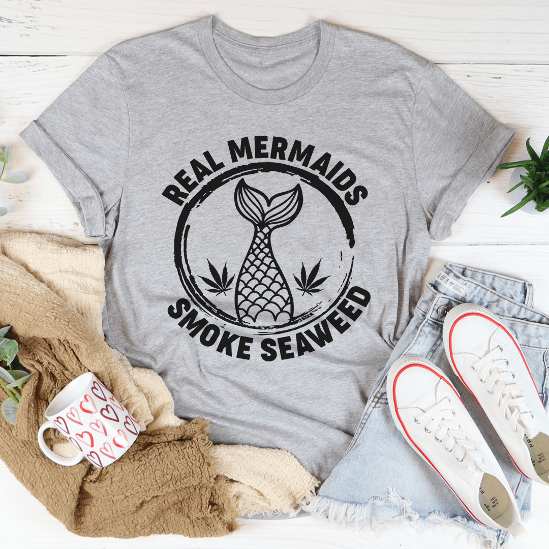 Real Mermaids T-Shirt featuring a whimsical mermaid design, made from soft ring-spun cotton with durable stitching.