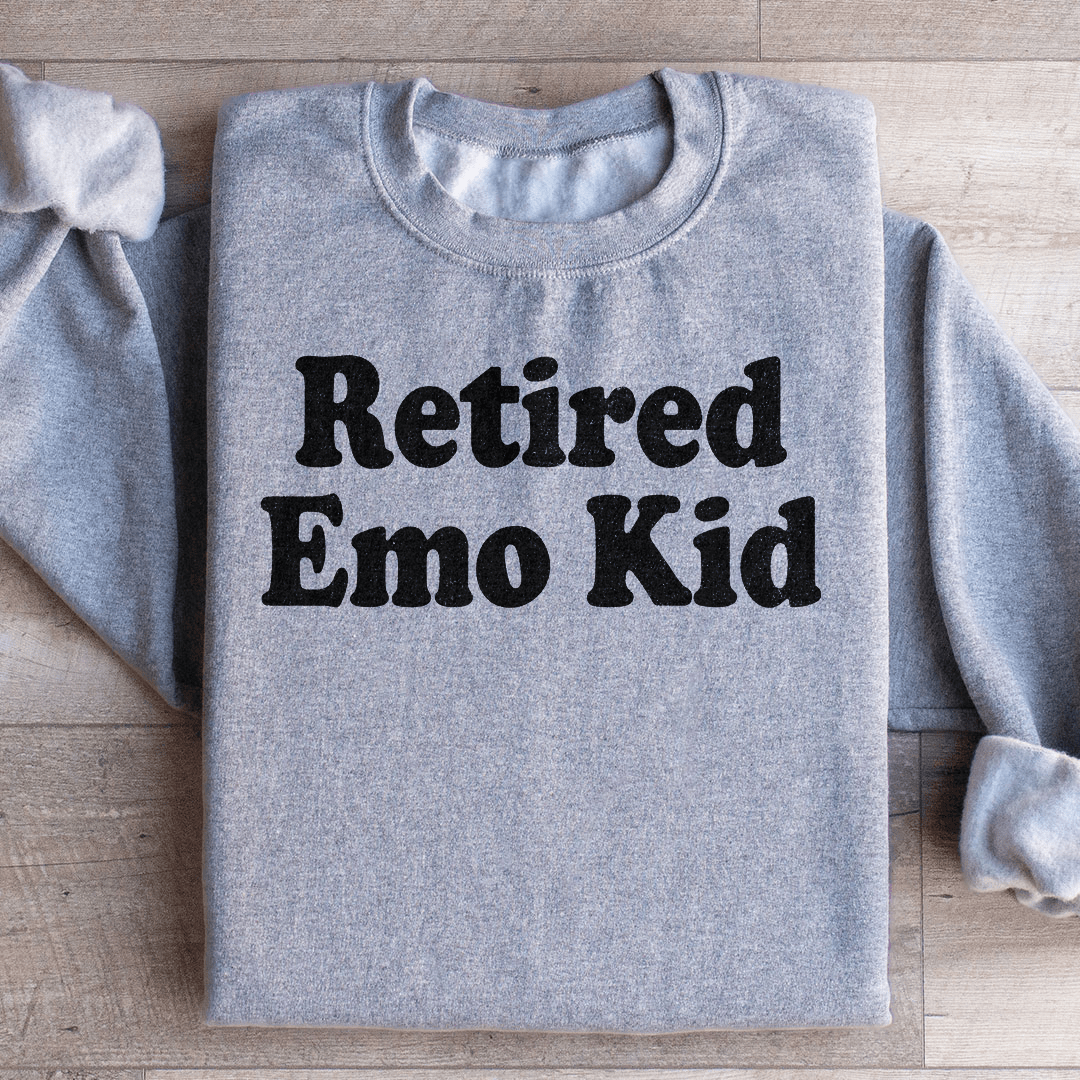 Retired Emo Kid hoodie featuring unique artistic design, cozy fleece lining, and adjustable cuffs.