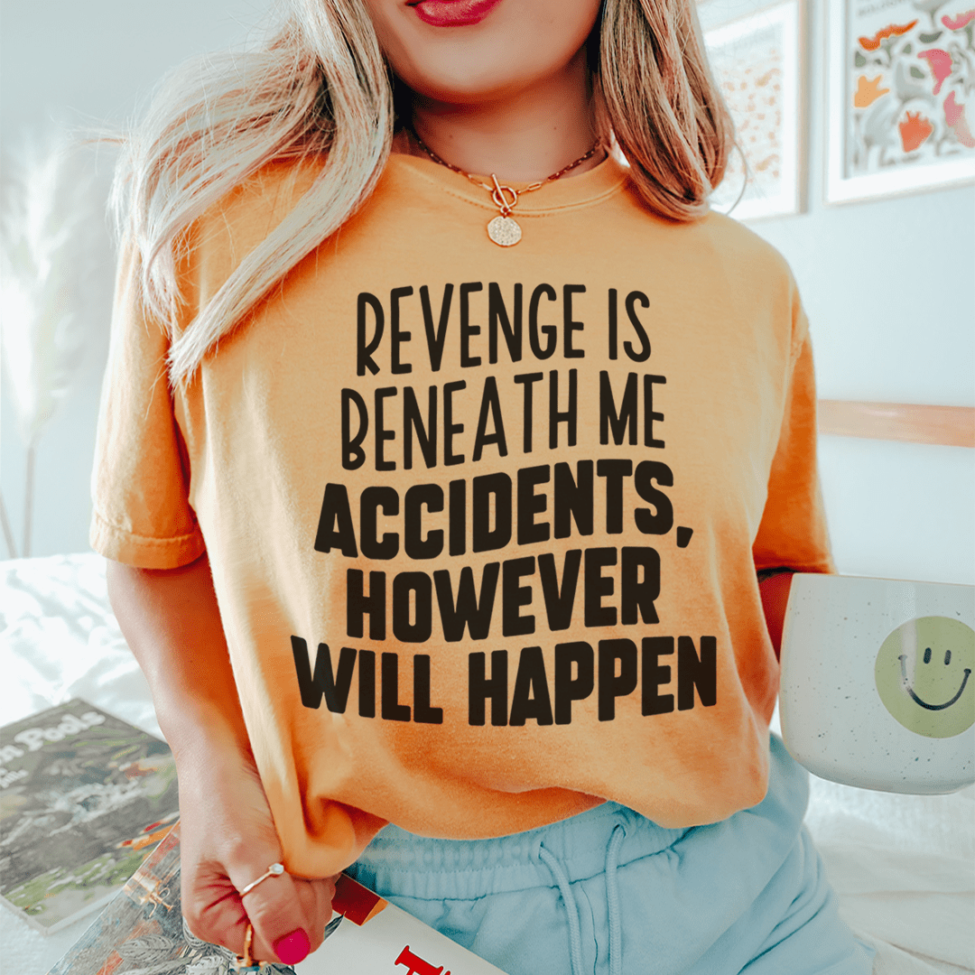 A stylish t-shirt featuring the phrase 'Revenge Is Beneath Me Accidents However Will Happen' printed on soft cotton fabric.