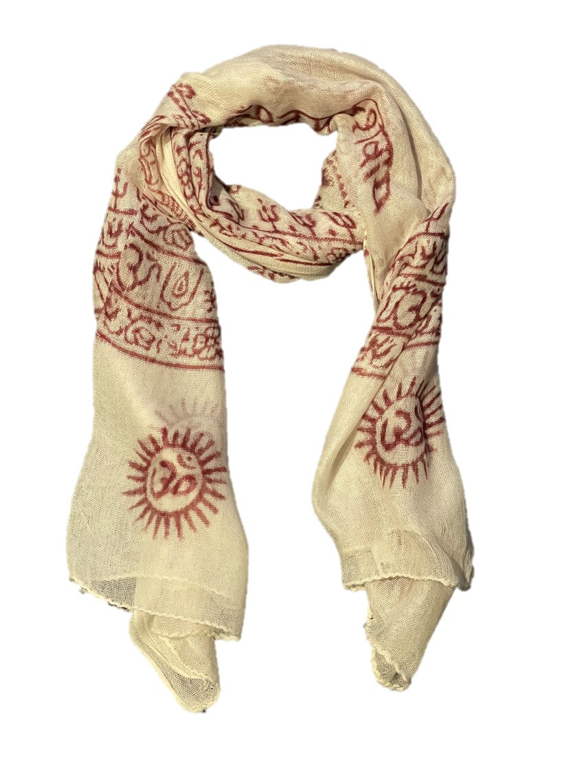 A vibrant Sanskrit Mantra scarf featuring the OM symbol and sacred designs in red on a colored background, made from soft Cotton Rayon fabric.