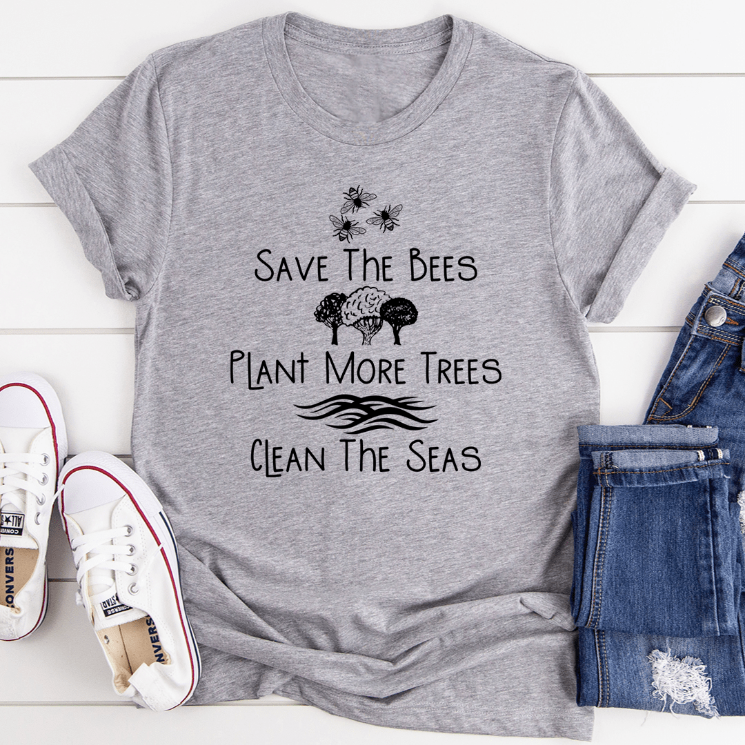 Save The Bees Plant More Trees Clean The Seas T-Shirt made of soft cotton, featuring a vibrant eco-friendly design.