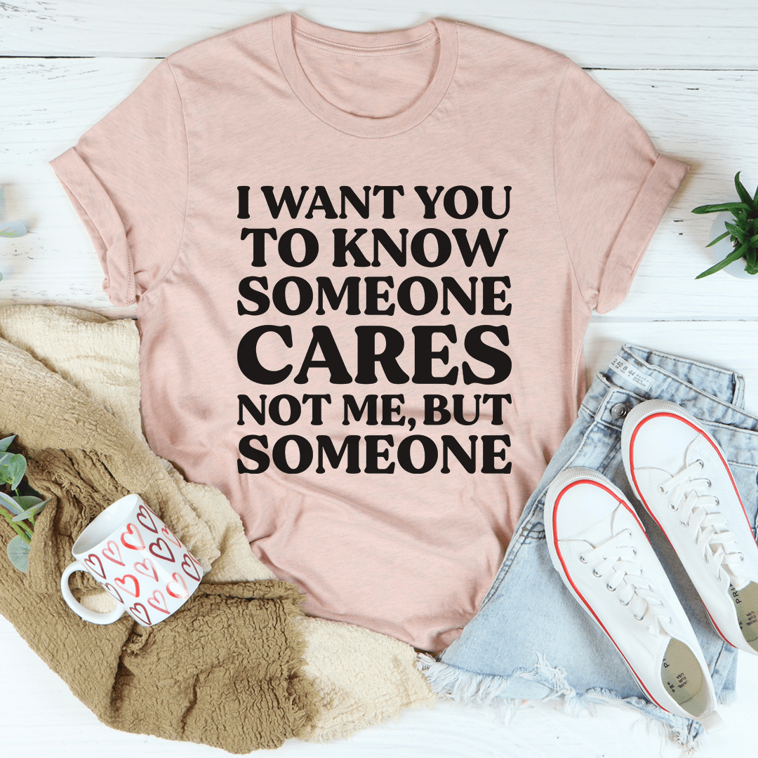 Someone Cares Tee made from soft ring-spun cotton, featuring double stitching for durability.