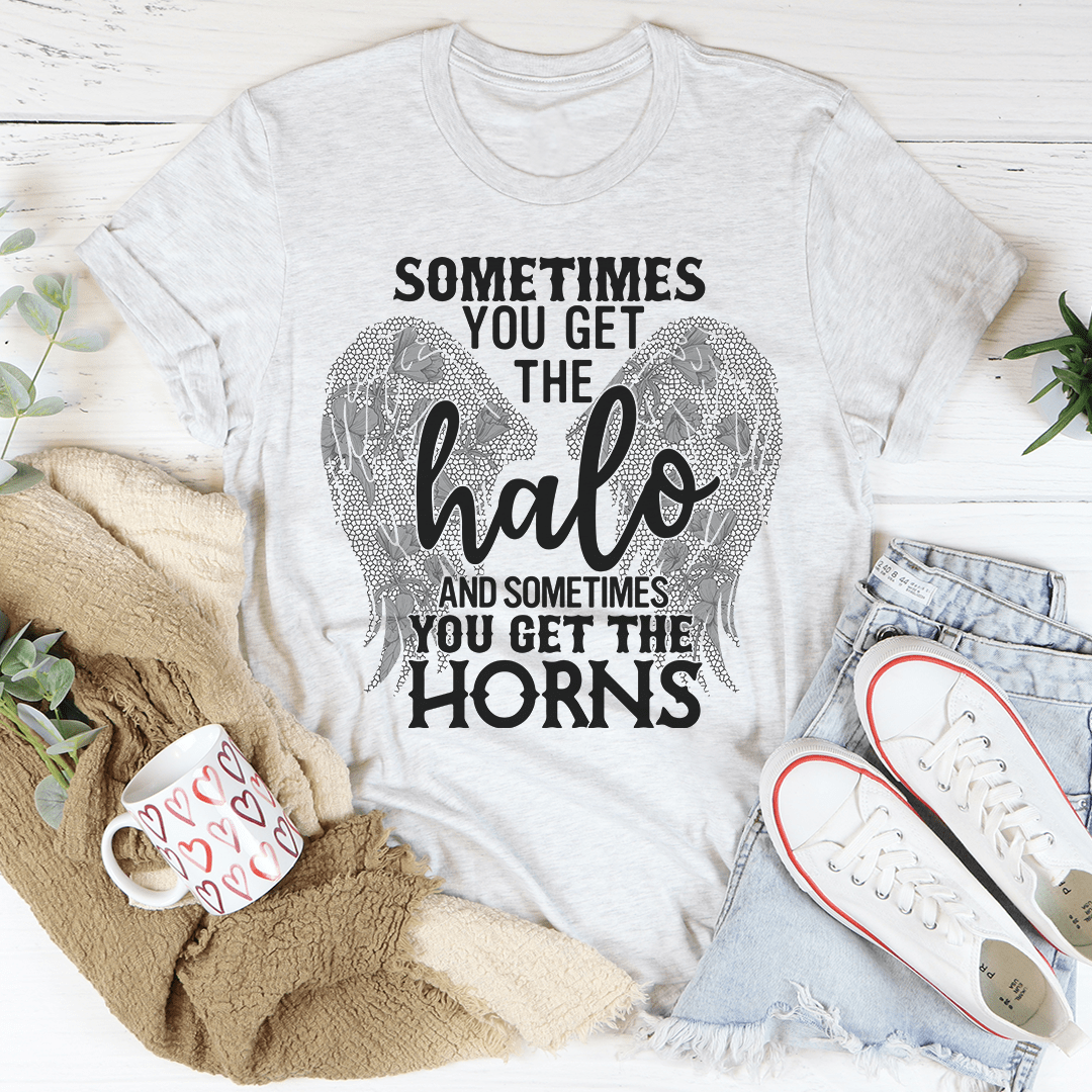 A stylish t-shirt featuring the phrase 'Sometimes You Get The Halo And Sometimes You Get The Horns', made from soft cotton with double stitching.