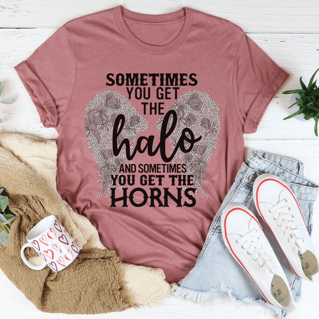 A stylish t-shirt featuring the phrase 'Sometimes You Get The Halo And Sometimes You Get The Horns', made from soft cotton with double stitching.