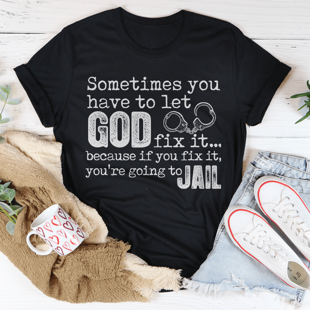 A comfortable and stylish t-shirt featuring the phrase 'Sometimes You Have To Let God Fix It' printed on it, made from soft ring-spun cotton.