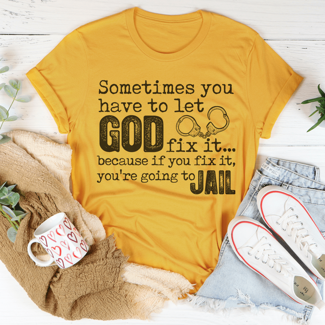 A comfortable and stylish t-shirt featuring the phrase 'Sometimes You Have To Let God Fix It' printed on it, made from soft ring-spun cotton.