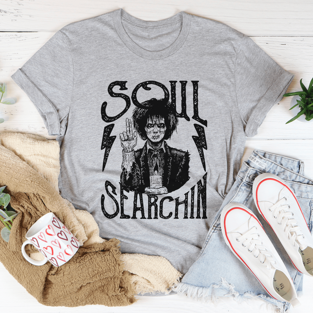 Soul Searchin Halloween Tee featuring spooky graphics on a soft cotton fabric, perfect for Halloween celebrations.