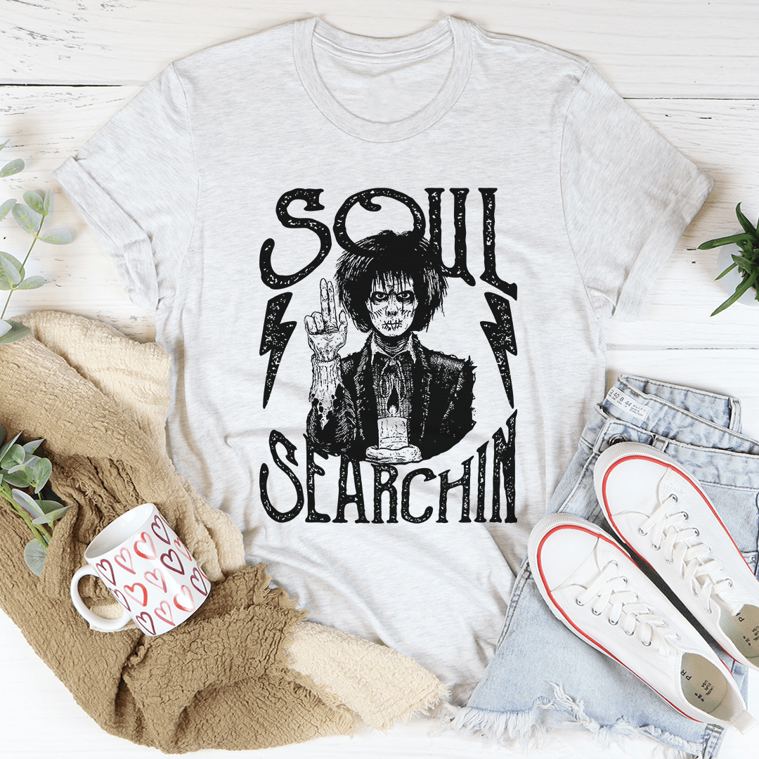 Soul Searchin Halloween Tee featuring spooky graphics on a soft cotton fabric, perfect for Halloween celebrations.