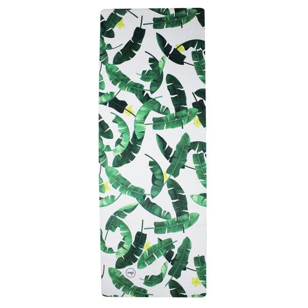 A beautifully printed travel yoga mat featuring a soft microfiber suede top and a natural rubber bottom, designed for optimal grip and comfort.