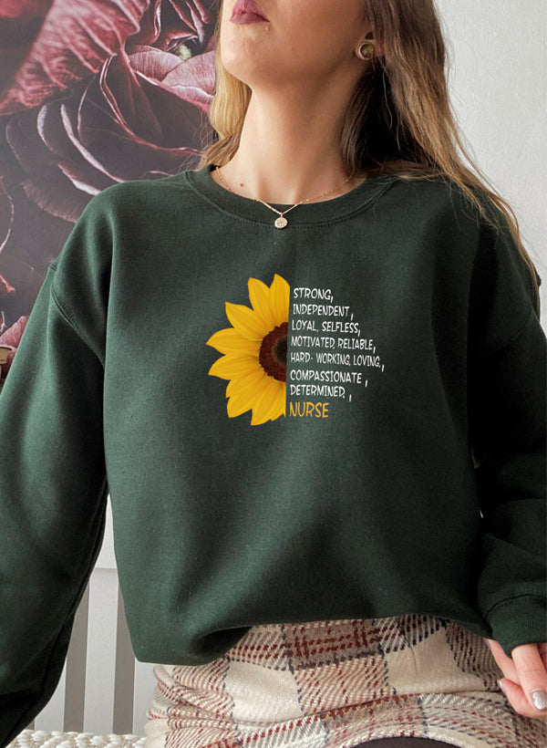 A cozy Sunflower Nurse Sweat Shirt featuring a vibrant sunflower design, perfect for nurses and casual wear.