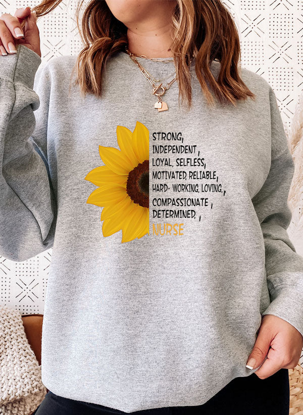 A cozy Sunflower Nurse Sweat Shirt featuring a vibrant sunflower design, perfect for nurses and casual wear.