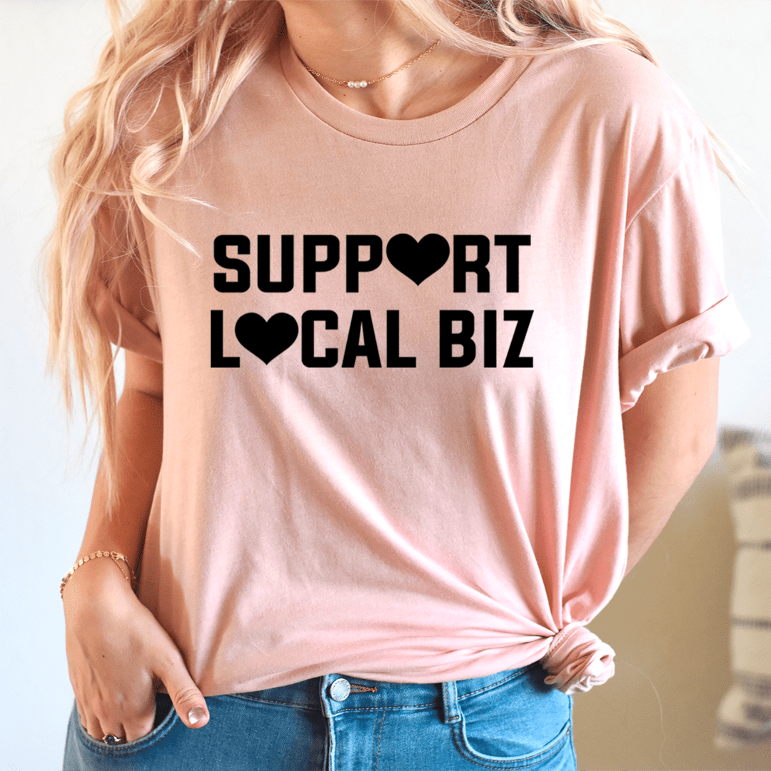 A comfortable Support Local Biz Tee made from soft ring-spun cotton, featuring double stitching for durability and a stylish design.