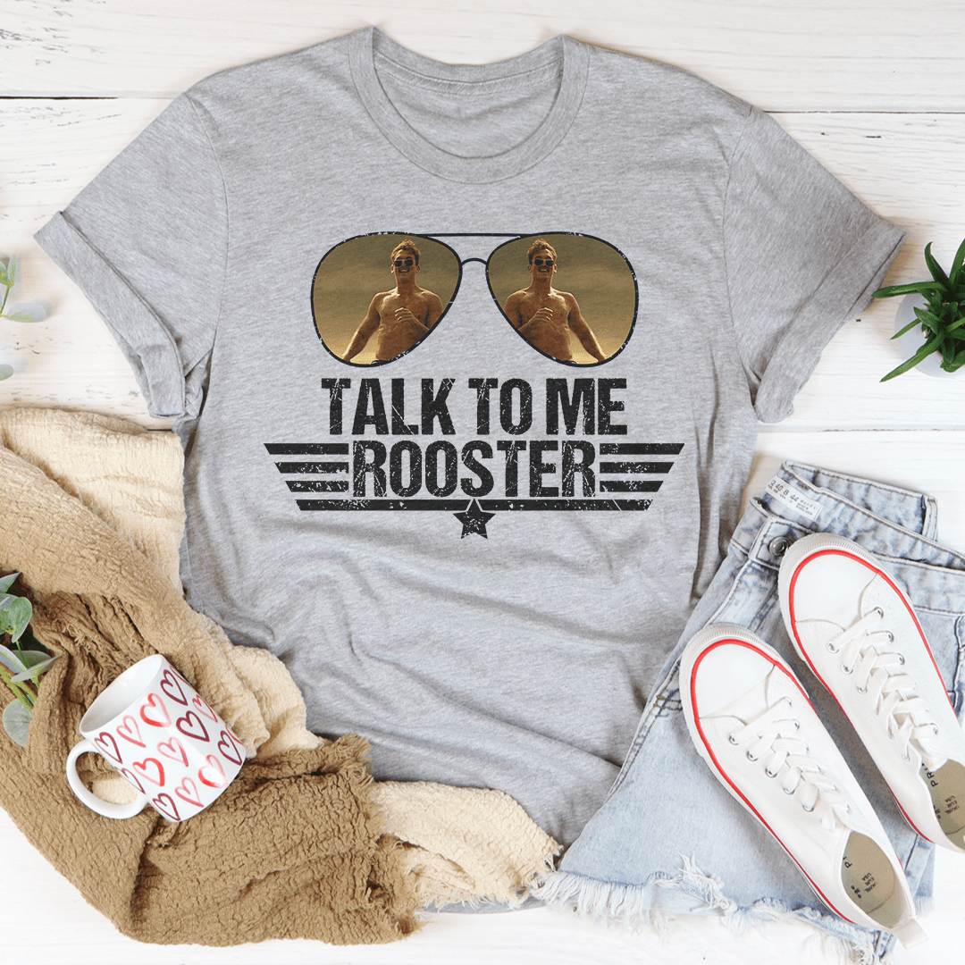 A stylish Talk To Me Rooster Tee made from soft ring-spun cotton, featuring a vibrant rooster design.