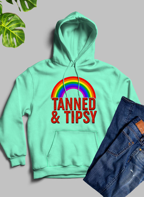 Tanned & Tipsy Hoodie featuring unique artistic designs and a cozy fleece blend material, perfect for casual wear.