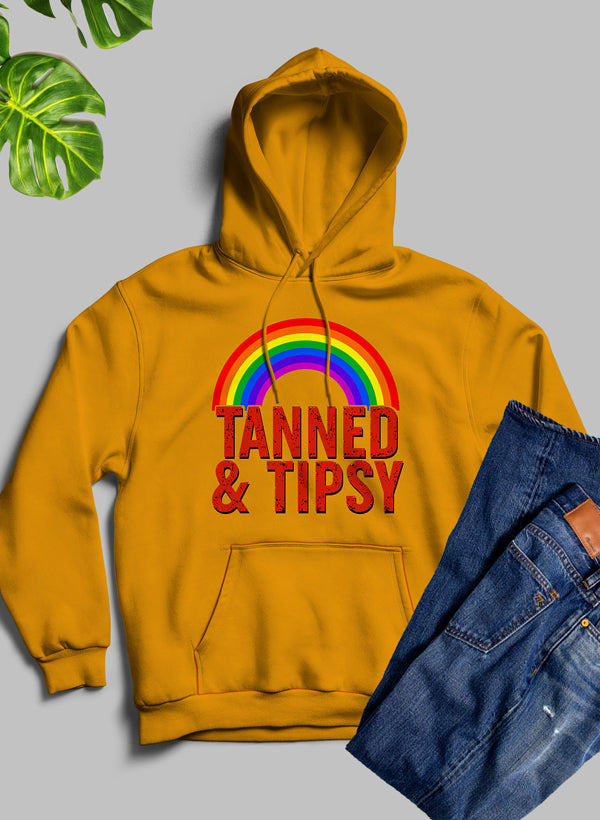 Tanned & Tipsy Hoodie featuring unique artistic designs and a cozy fleece blend material, perfect for casual wear.