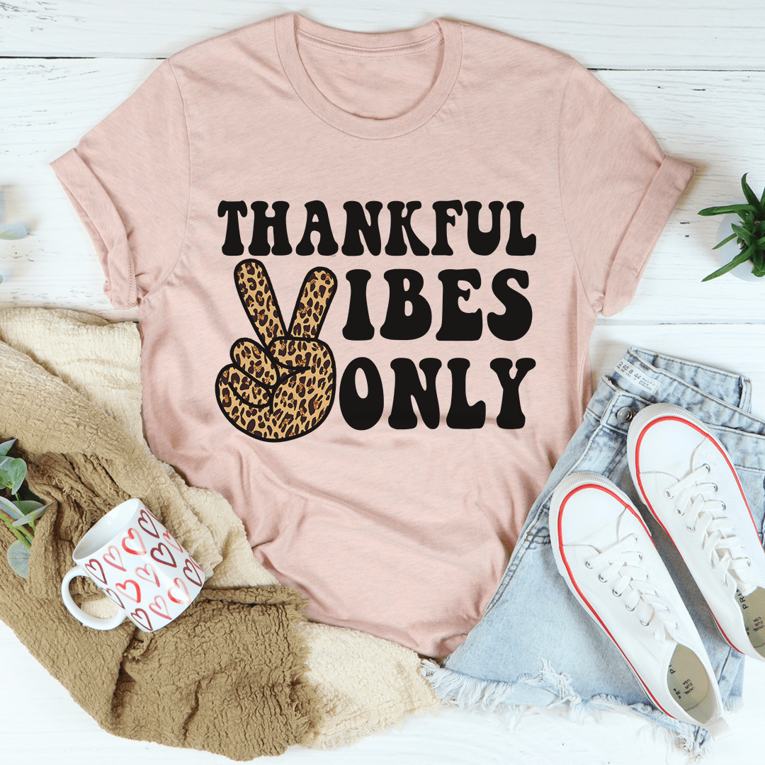 A soft, durable Thankful Vibes Only T-Shirt in various colors, showcasing its positive message and comfortable fit.