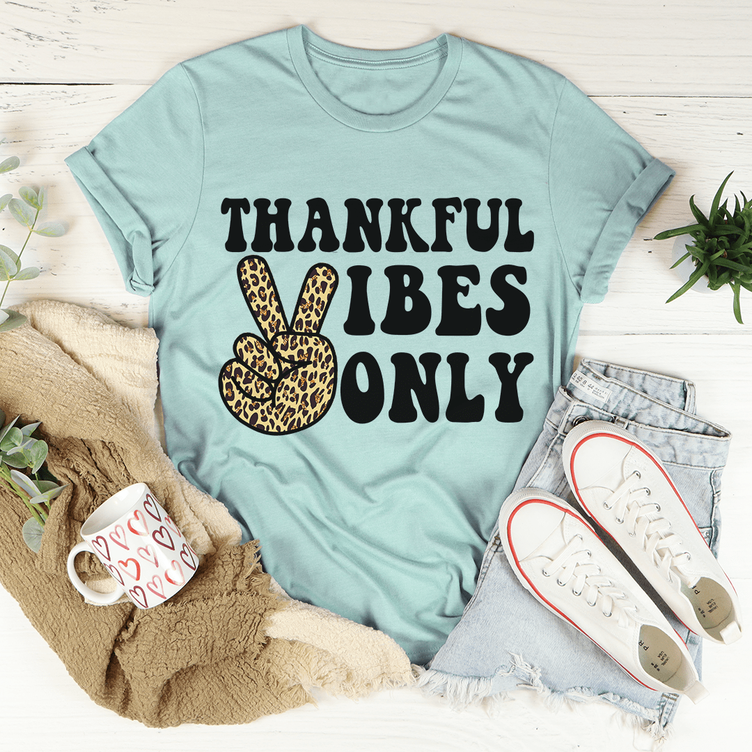 A soft, durable Thankful Vibes Only T-Shirt in various colors, showcasing its positive message and comfortable fit.