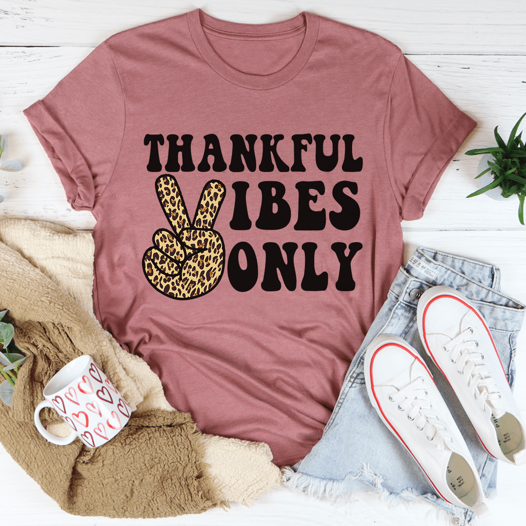 A soft, durable Thankful Vibes Only T-Shirt in various colors, showcasing its positive message and comfortable fit.