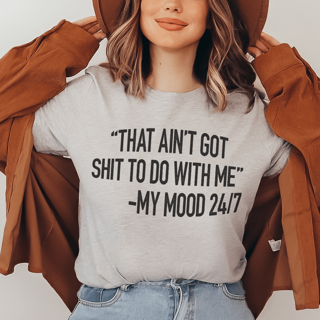 A stylish black t-shirt featuring the phrase 'That Ain't Got Nothing To Do With Me' printed in a bold font, showcasing its soft fabric and durable stitching.