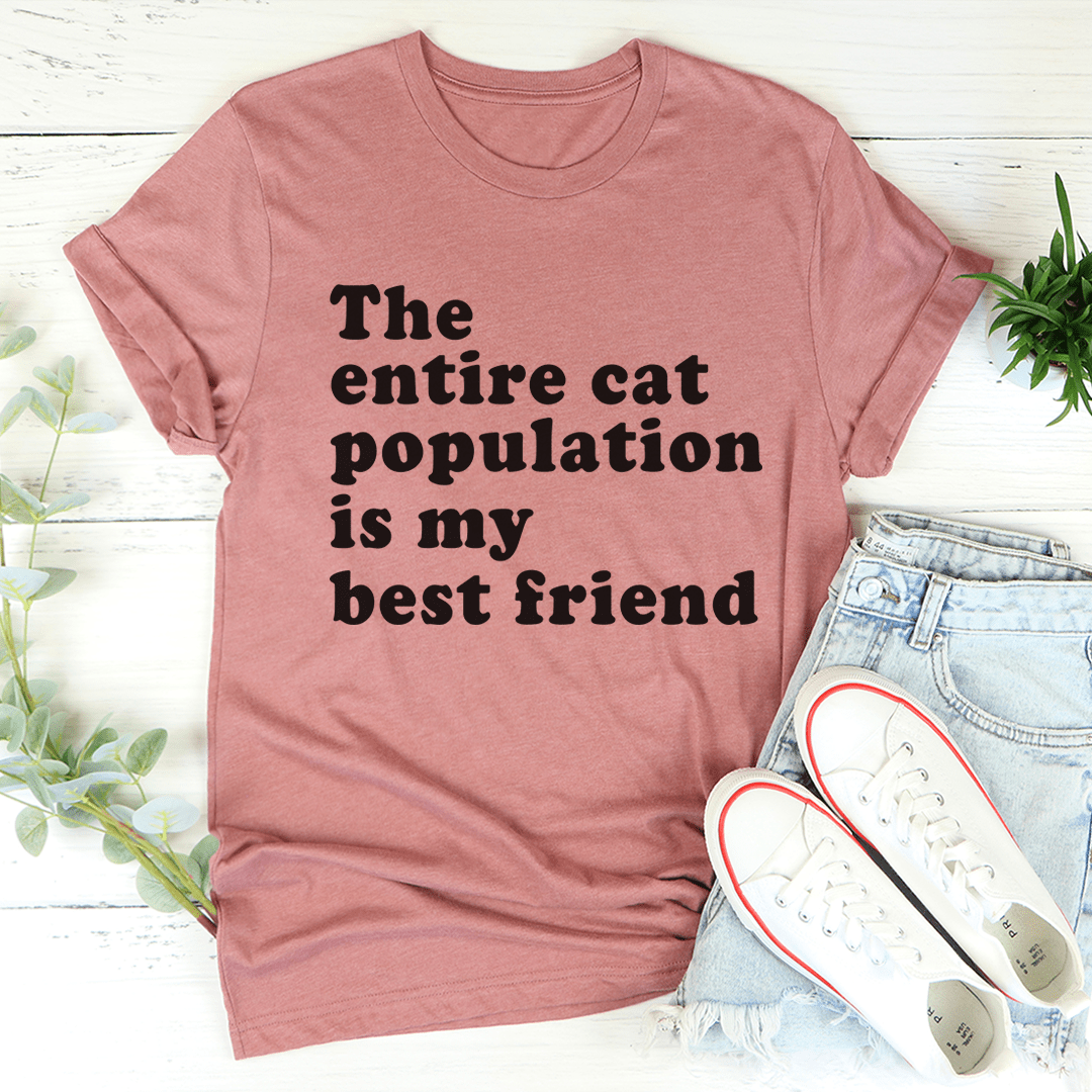 A comfortable t-shirt featuring the slogan 'The Entire Cat Population Is My Best Friend' printed on soft cotton fabric.