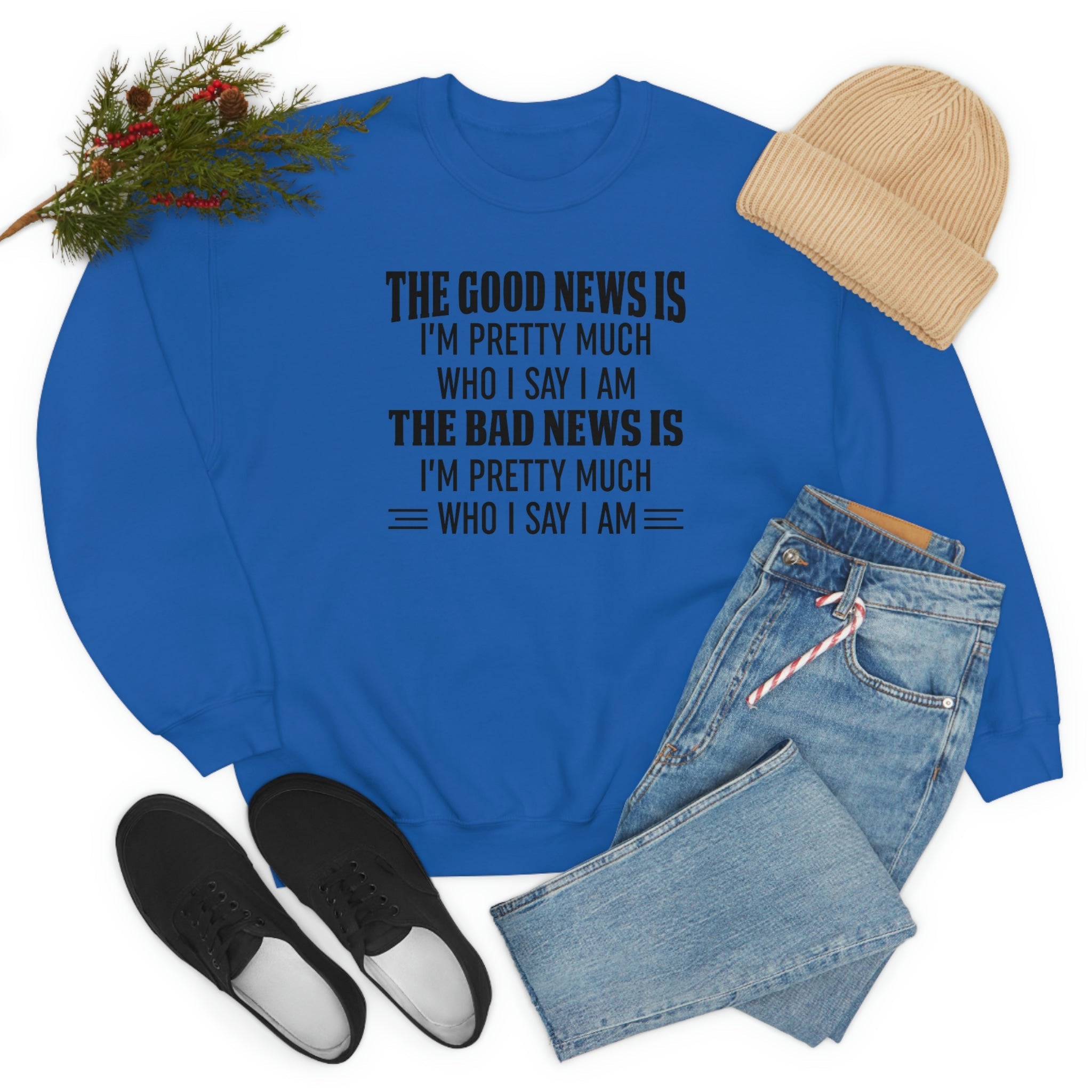 A cozy sweatshirt featuring the phrase 'The Good News Is I'm Pretty Much Who I Say I Am' in stylish print, made from soft ring-spun cotton.