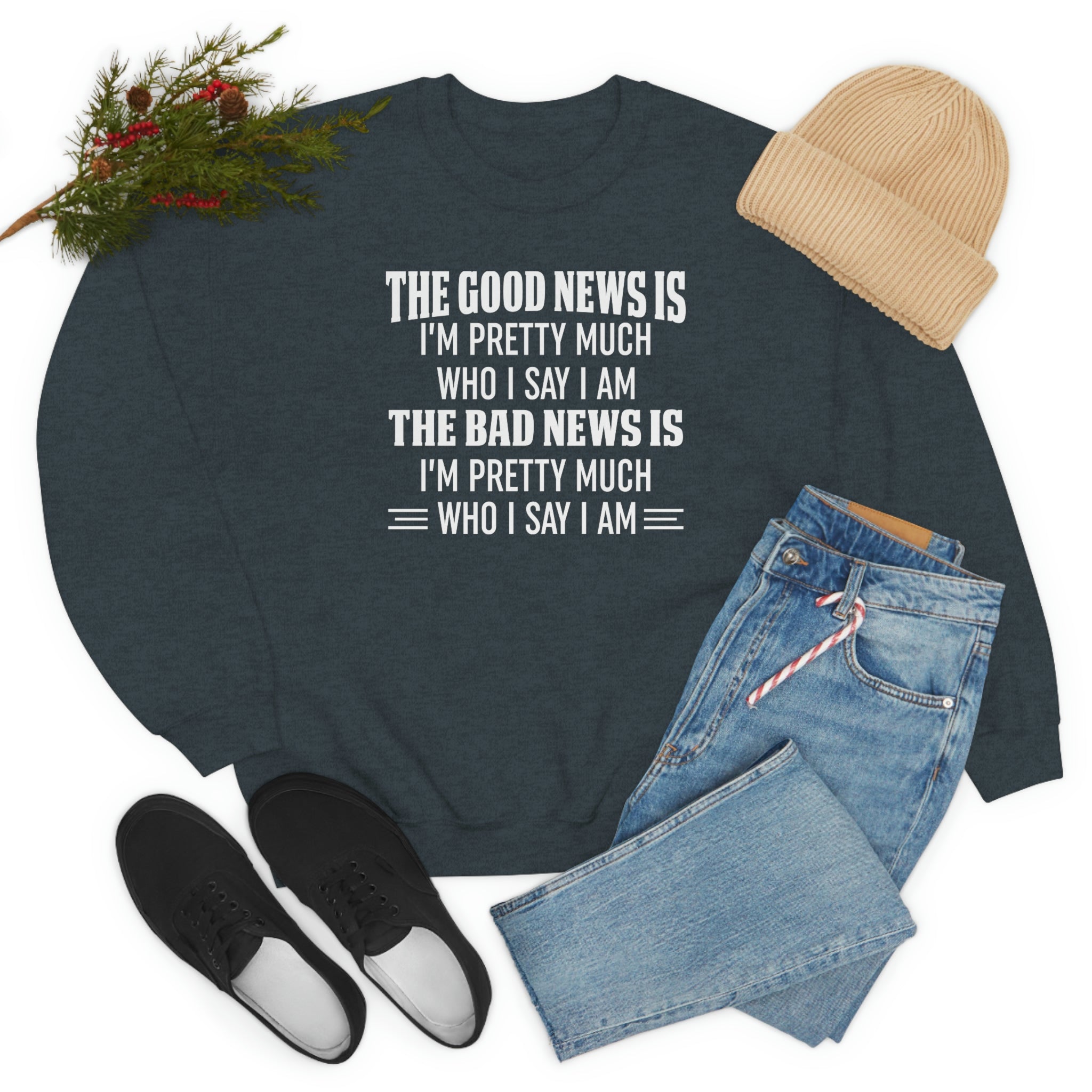 A cozy sweatshirt featuring the phrase 'The Good News Is I'm Pretty Much Who I Say I Am' in stylish print, made from soft ring-spun cotton.