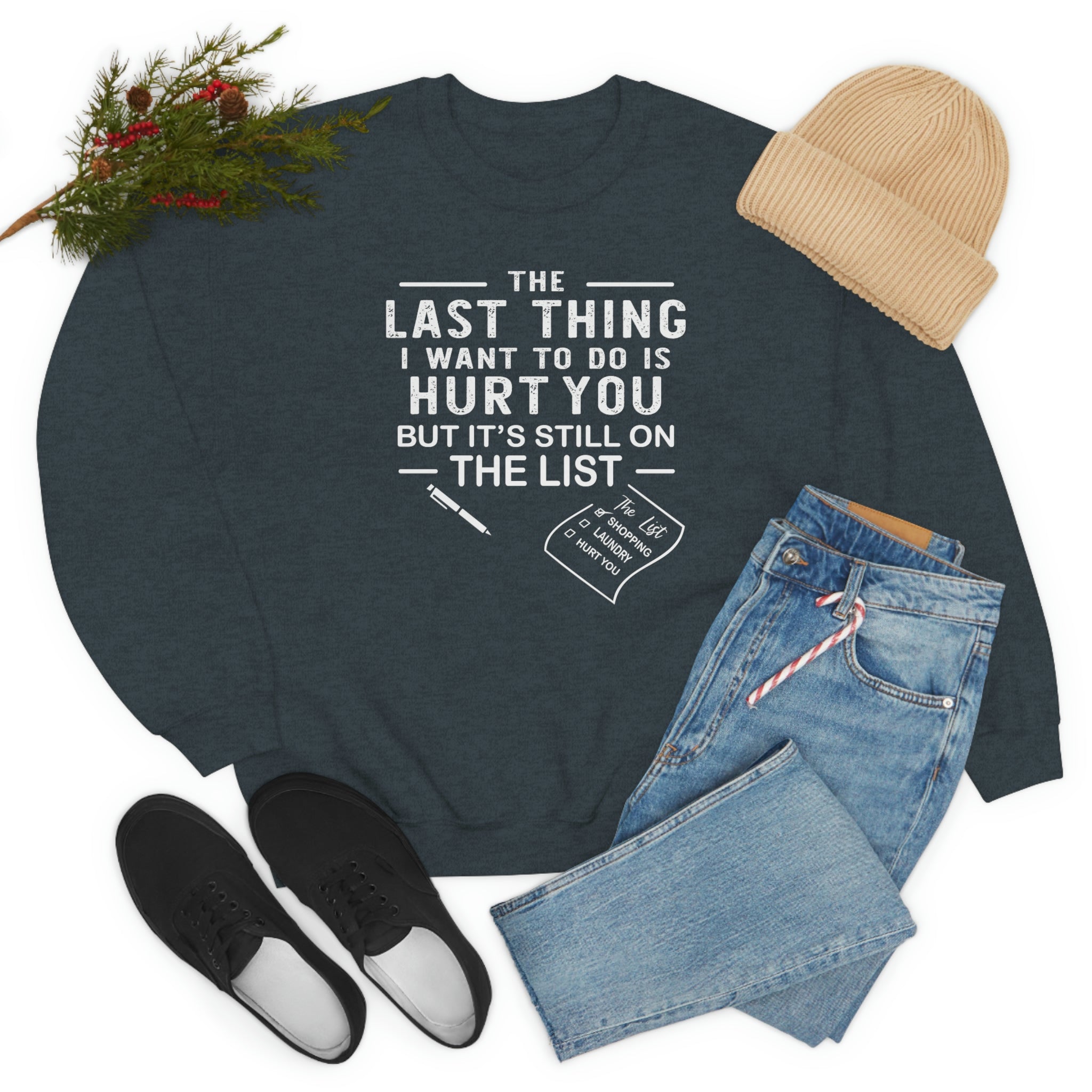 A cozy and stylish sweatshirt featuring the phrase 'The Last Thing I Want To Do' in a comfortable fit, perfect for casual wear.