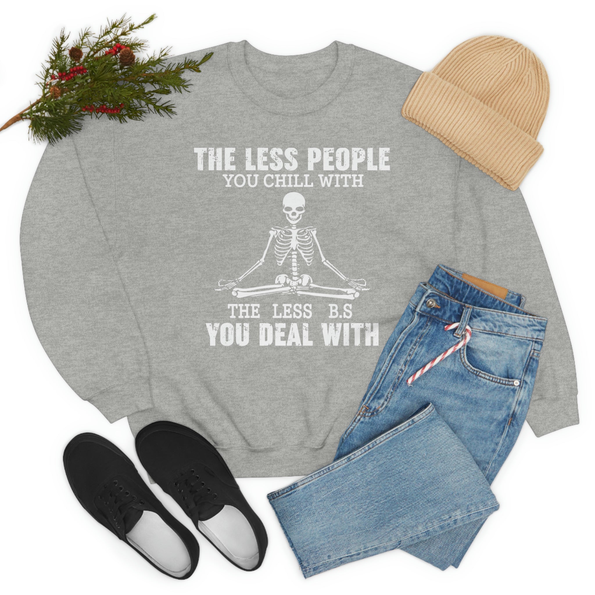 A comfortable and stylish t-shirt featuring the phrase 'The Less People You Chill With', made from soft ring-spun cotton with durable stitching.