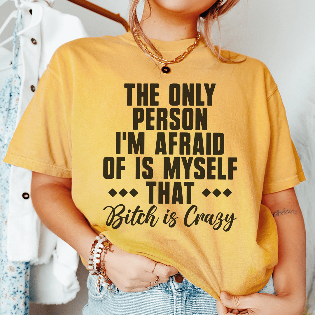 A stylish black t-shirt featuring the phrase 'The Only Person I'm Afraid Of Is Myself' printed in bold letters.