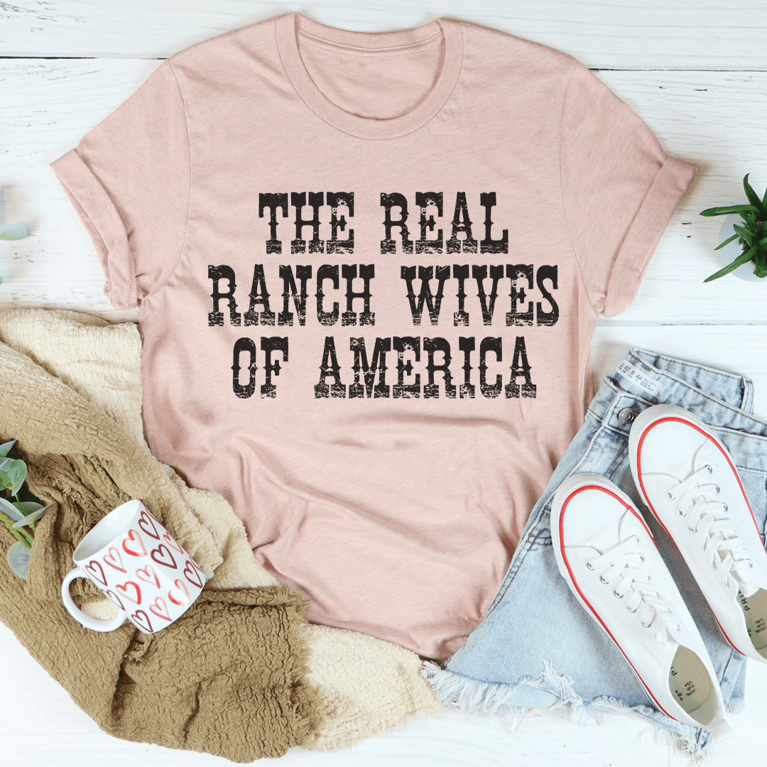 The Real Ranch Wives Of America T-Shirt displayed on a mannequin, showcasing its soft cotton fabric and durable stitching.