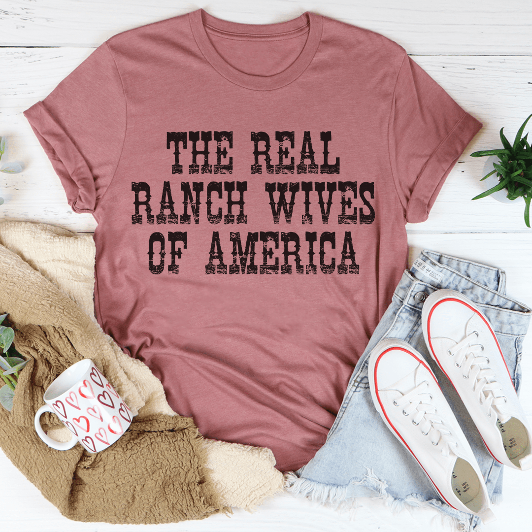 The Real Ranch Wives Of America T-Shirt displayed on a mannequin, showcasing its soft cotton fabric and durable stitching.