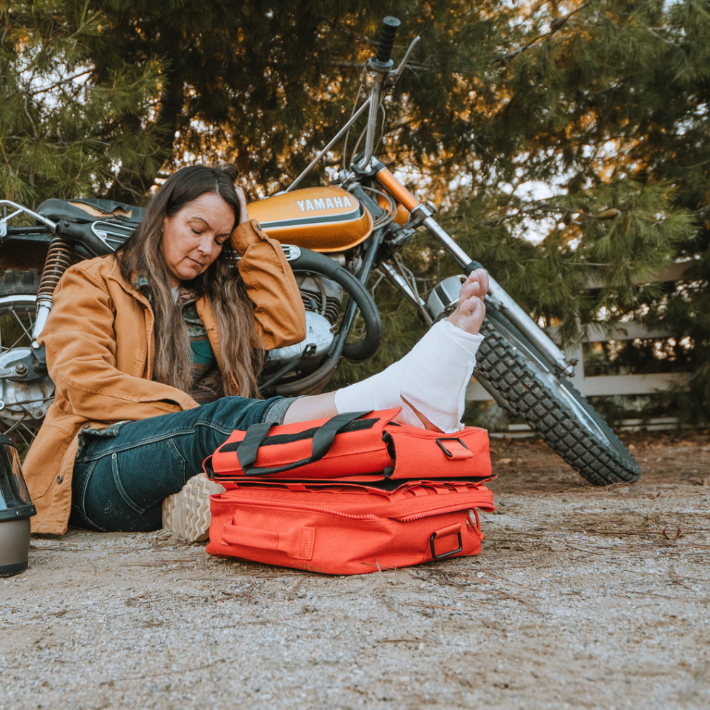 The Roadie + featuring a quick-release trauma pack, designed for emergency preparedness with essential life-saving items.