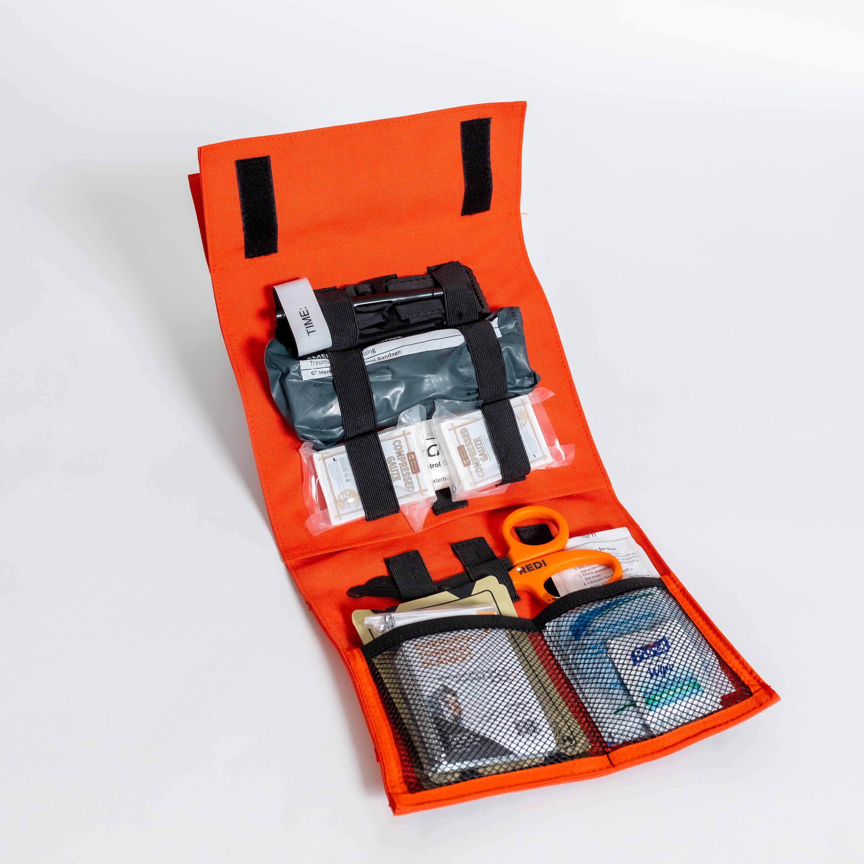 The Roadie + featuring a quick-release trauma pack, designed for emergency preparedness with essential life-saving items.