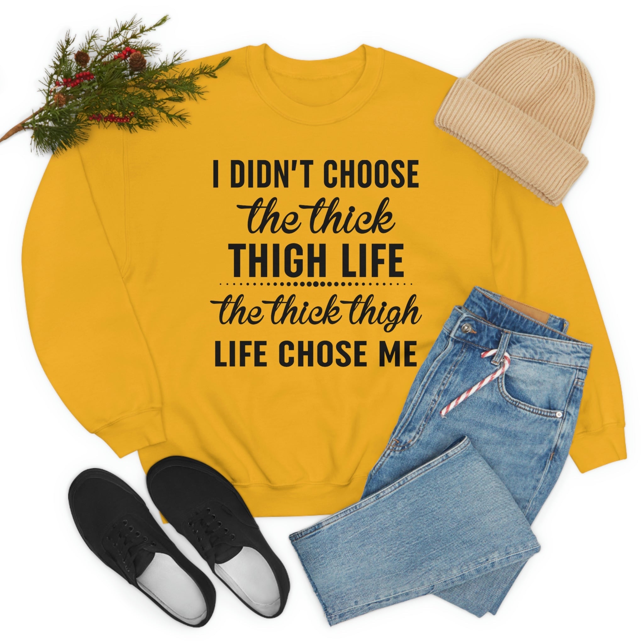 The Thick Thigh Life t-shirt in various colors, showcasing its soft cotton fabric and durable double stitching.