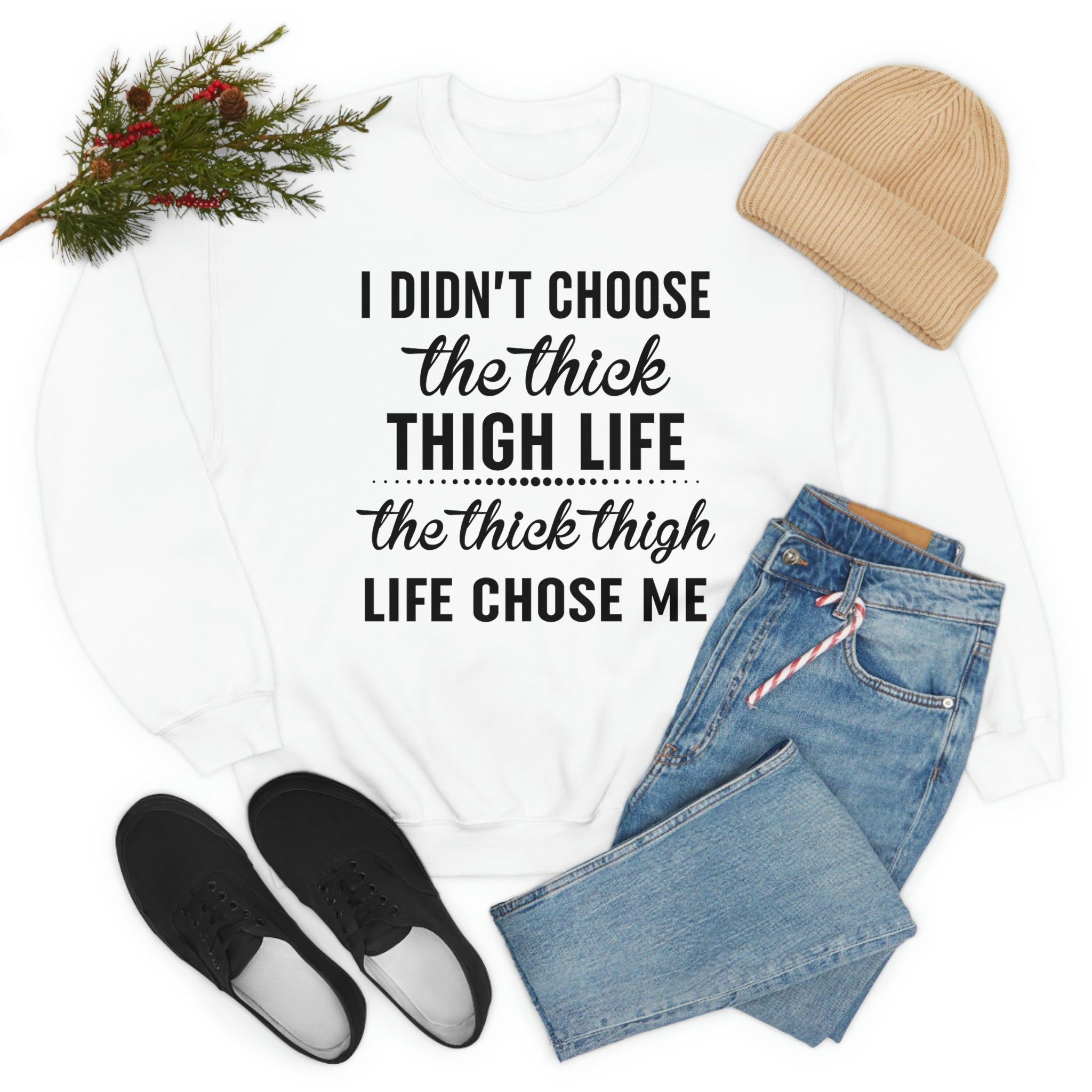 The Thick Thigh Life t-shirt in various colors, showcasing its soft cotton fabric and durable double stitching.