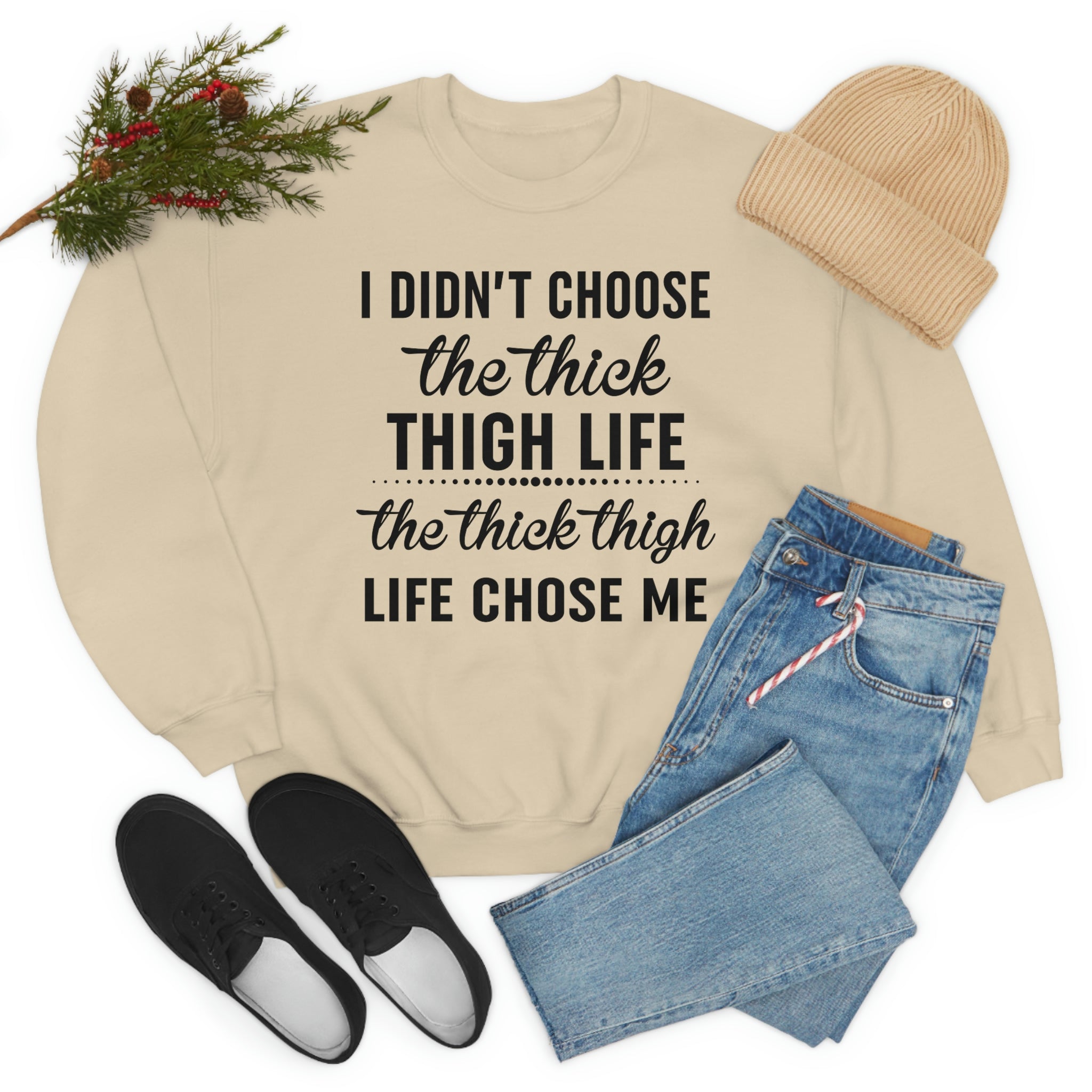 The Thick Thigh Life t-shirt in various colors, showcasing its soft cotton fabric and durable double stitching.