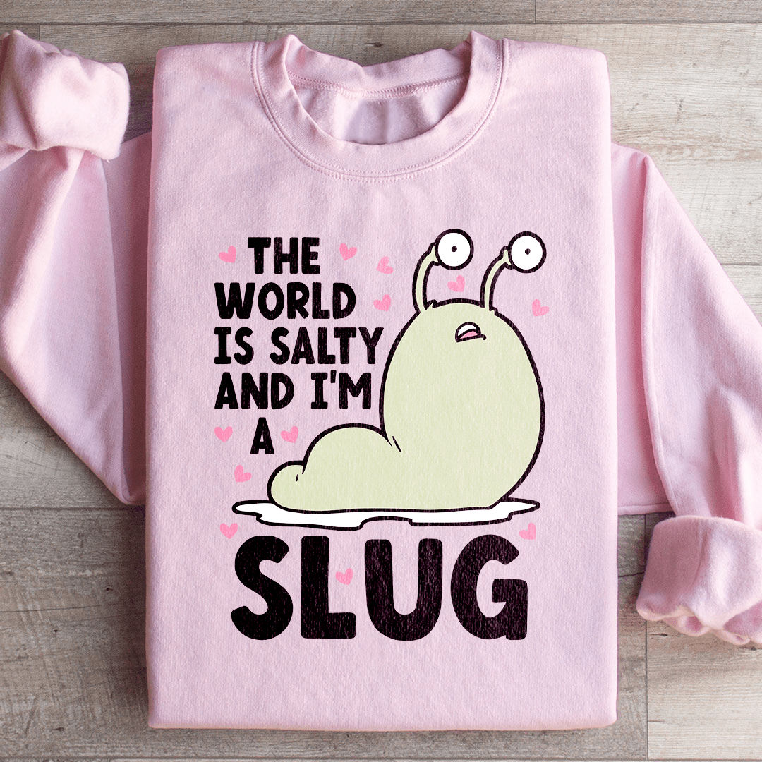 A cozy hoodie featuring the design 'The World Is Salty And I'm A Slug', made from a cotton/poly fleece blend with adjustable cuffs.