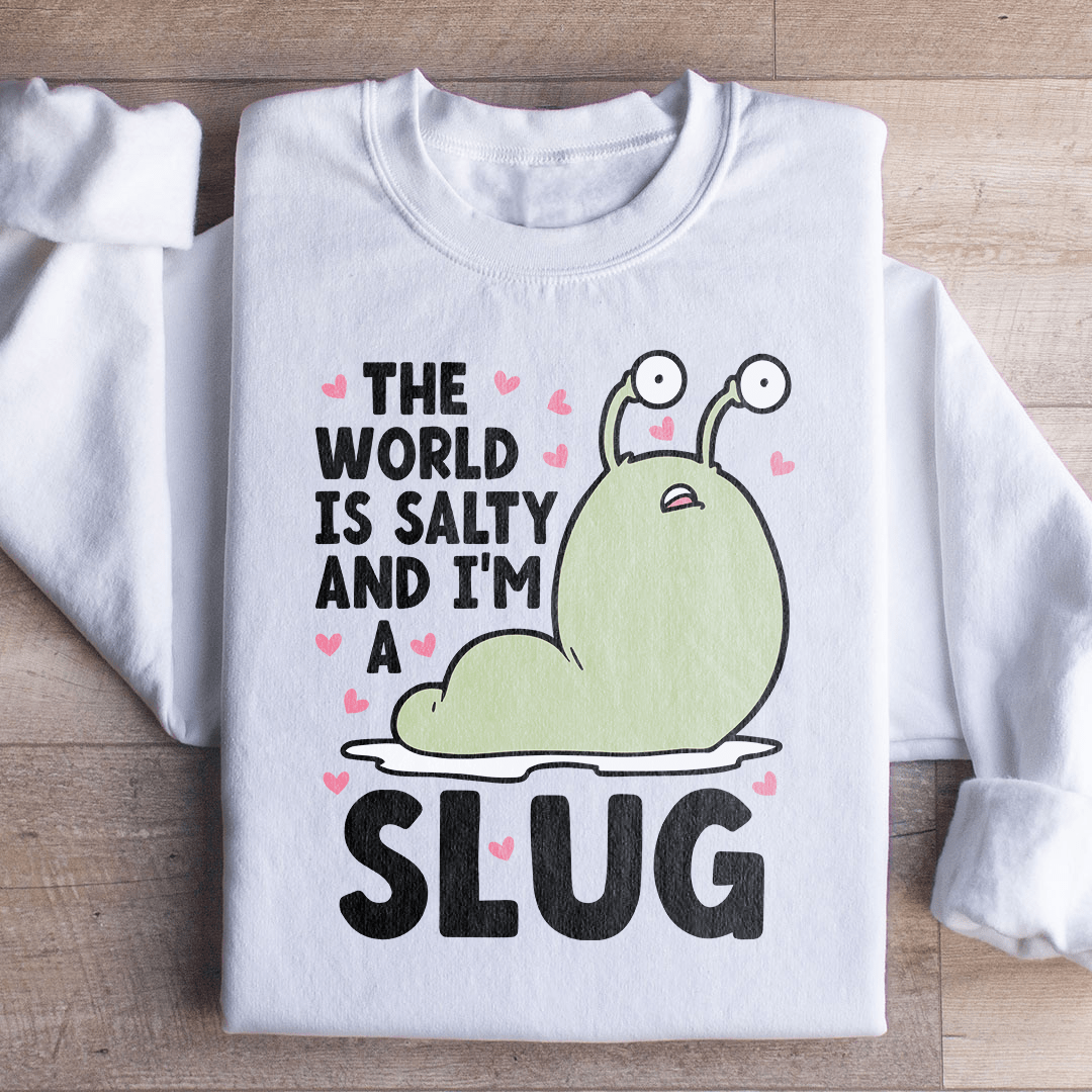 A cozy hoodie featuring the design 'The World Is Salty And I'm A Slug', made from a cotton/poly fleece blend with adjustable cuffs.