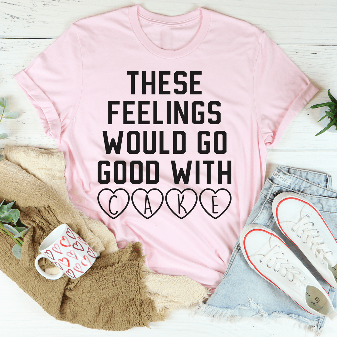 A comfortable and stylish t-shirt featuring the phrase 'These Feelings Would Go Good With Cake', made from soft ring-spun cotton.